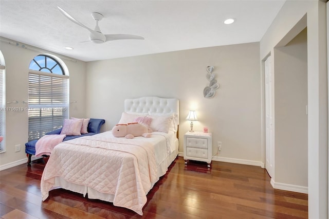 bedroom featuring hardwood / wood-style flooring, baseboards, recessed lighting, and a ceiling fan