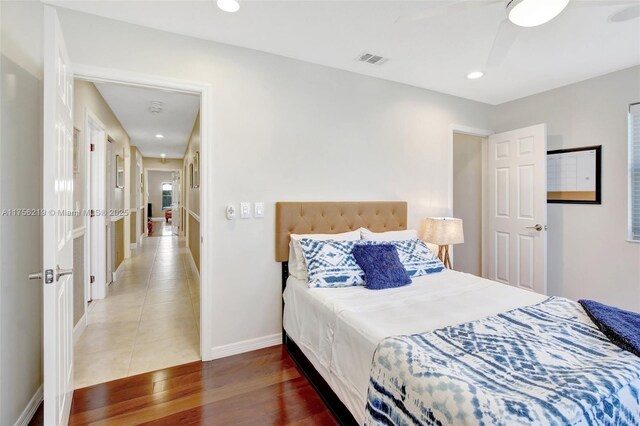 12200 SW 2nd St, Plantation, FL 33325 - bedroom with baseboards, wood finished floors, and recessed lighting