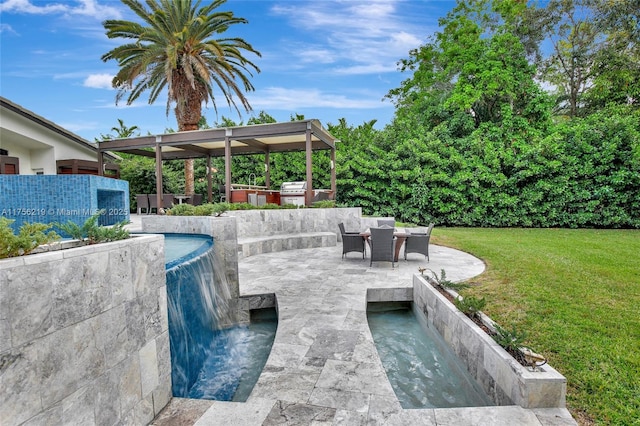 view of pool featuring an outdoor kitchen, a yard, a patio area, and outdoor dining space