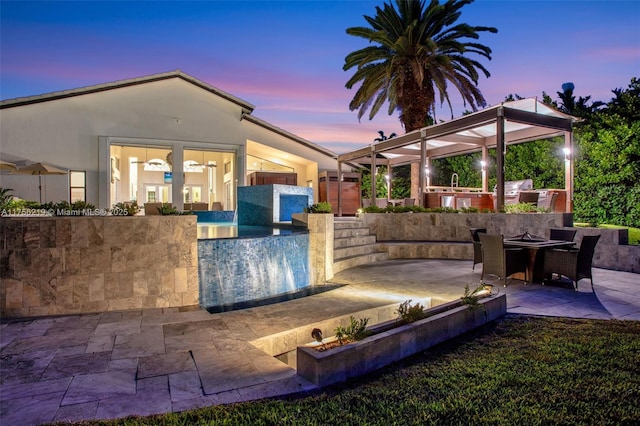 back of house featuring a patio