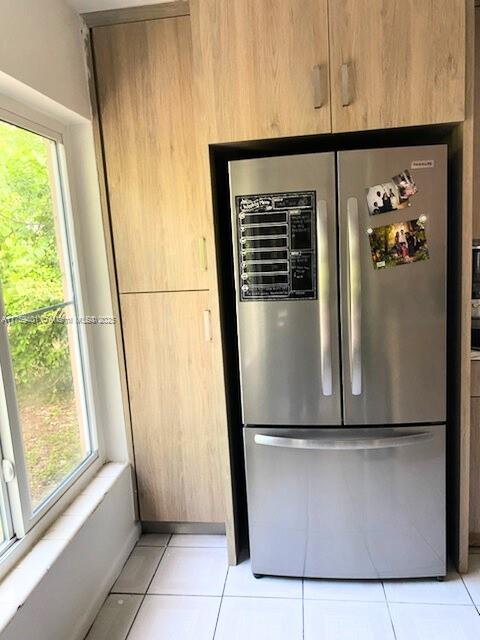 interior details with freestanding refrigerator