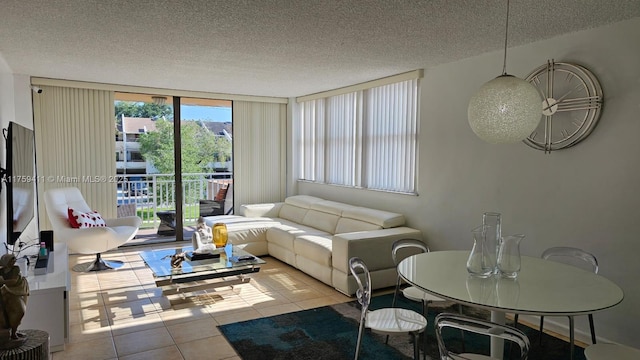 tiled living room with a textured ceiling