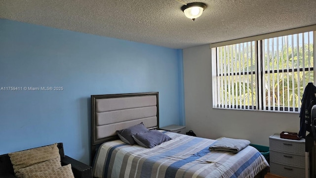 bedroom with a textured ceiling