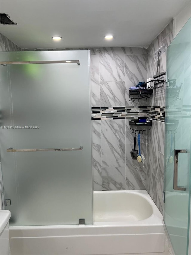 full bath with toilet, visible vents, bath / shower combo with glass door, and recessed lighting