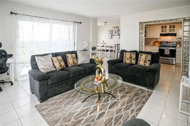 living area with light tile patterned flooring