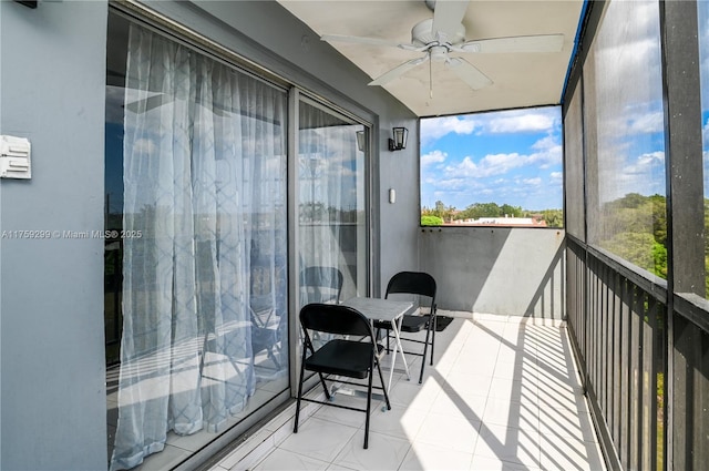 balcony with a ceiling fan and a sunroom