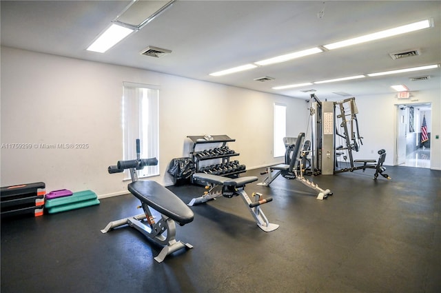 gym with visible vents and baseboards