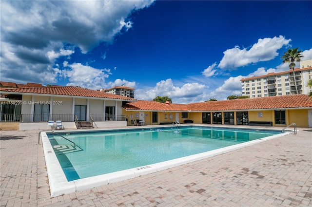 community pool with a patio