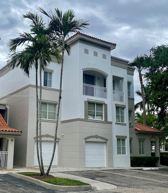 view of building exterior with an attached garage