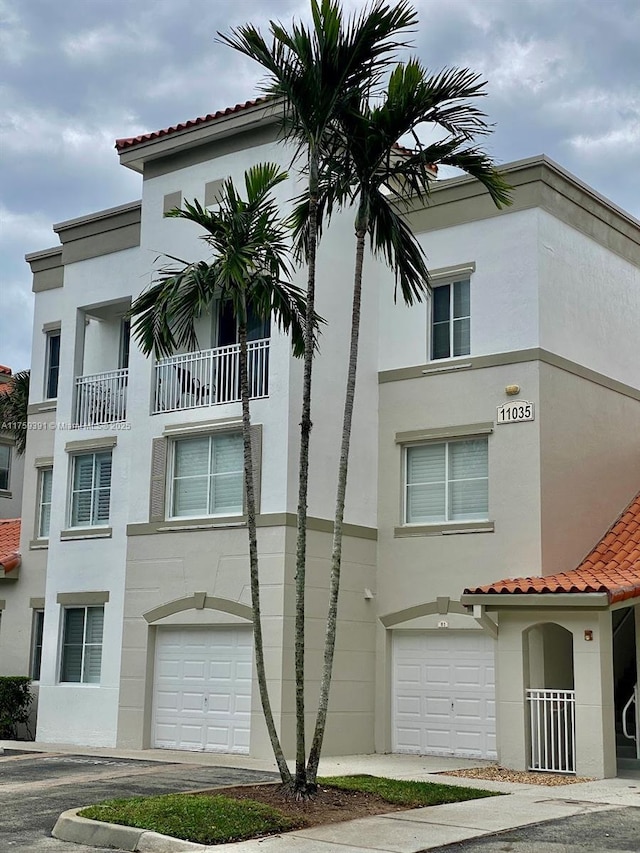 view of property featuring a garage