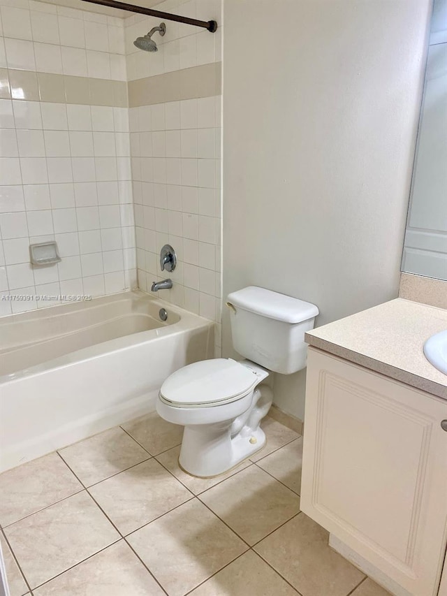 full bath featuring tile patterned floors, toilet, shower / washtub combination, and vanity