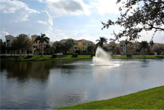 view of water feature with a residential view