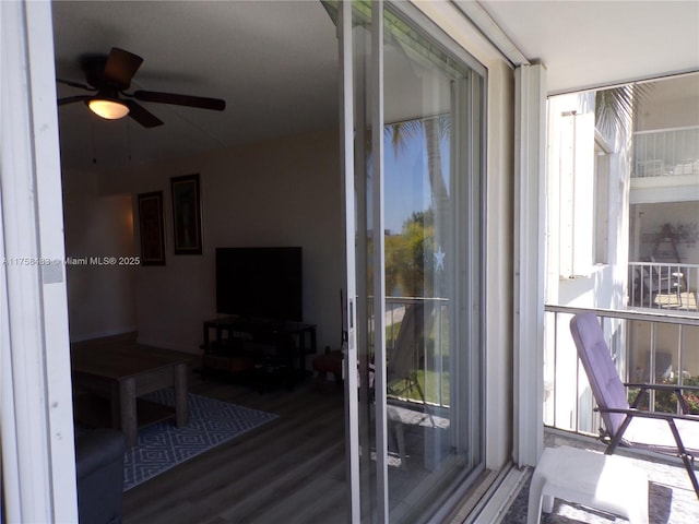 balcony featuring ceiling fan