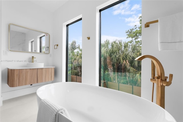 1823 NE 26th Ave, Fort Lauderdale, FL 33305 - full bathroom featuring a soaking tub and vanity