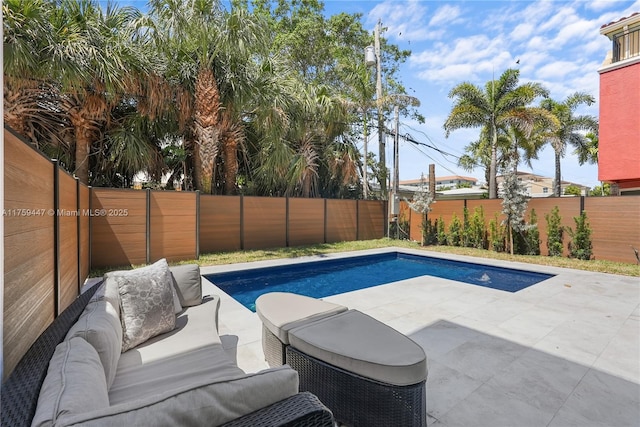 1823 NE 26th Ave, Fort Lauderdale, FL 33305 - view of swimming pool featuring a fenced backyard, outdoor lounge area, and a patio