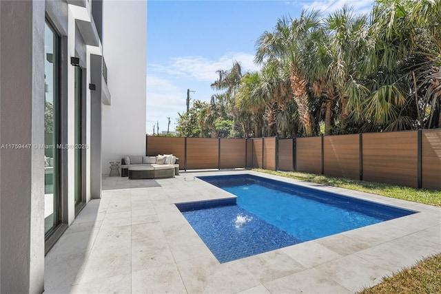 1823 NE 26th Ave, Fort Lauderdale, FL 33305 - view of swimming pool featuring a fenced in pool, a fenced backyard, and a patio area