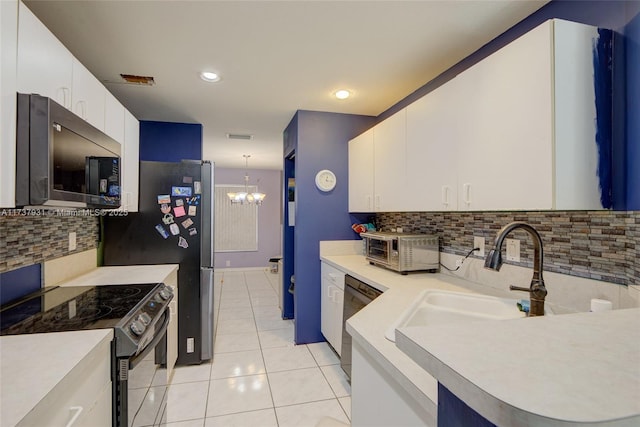 kitchen featuring dishwashing machine, black electric range oven, light countertops, white cabinetry, and light tile patterned flooring