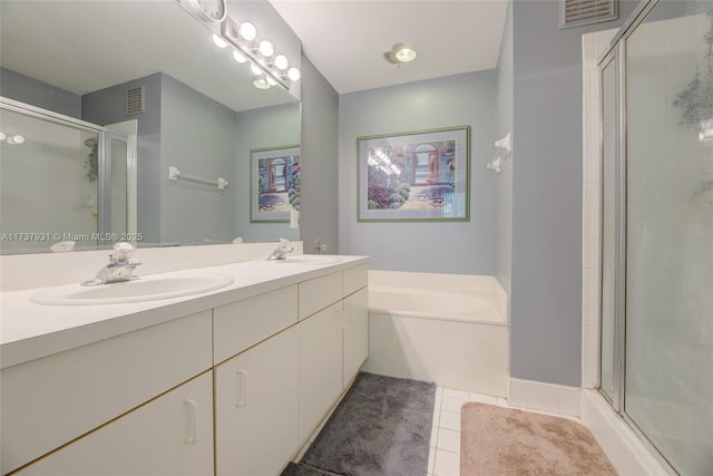 full bath featuring tile patterned flooring, visible vents, a sink, and a shower stall