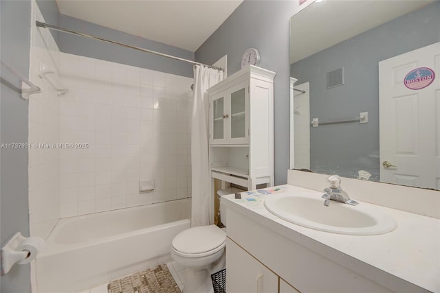 bathroom featuring toilet, tile patterned floors, shower / bath combination with curtain, and vanity