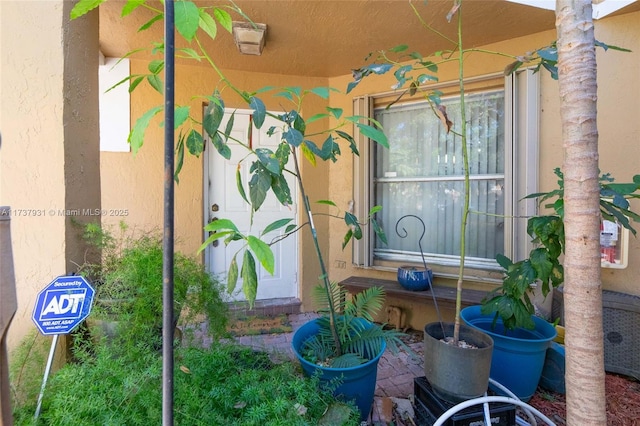 exterior space featuring stucco siding