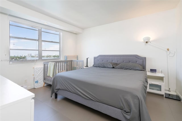 bedroom featuring baseboards