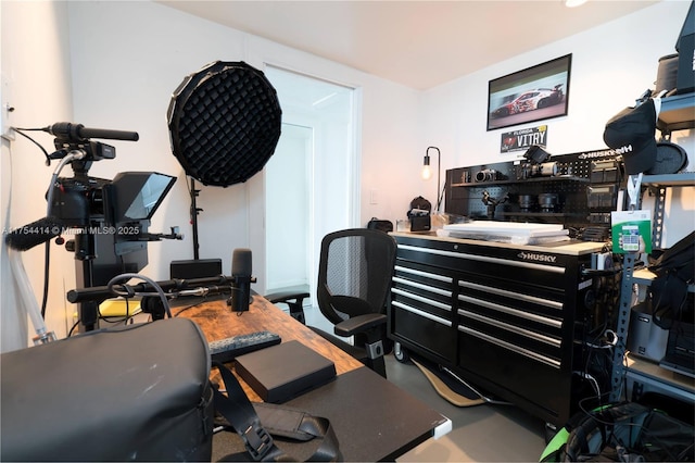 home office with finished concrete flooring