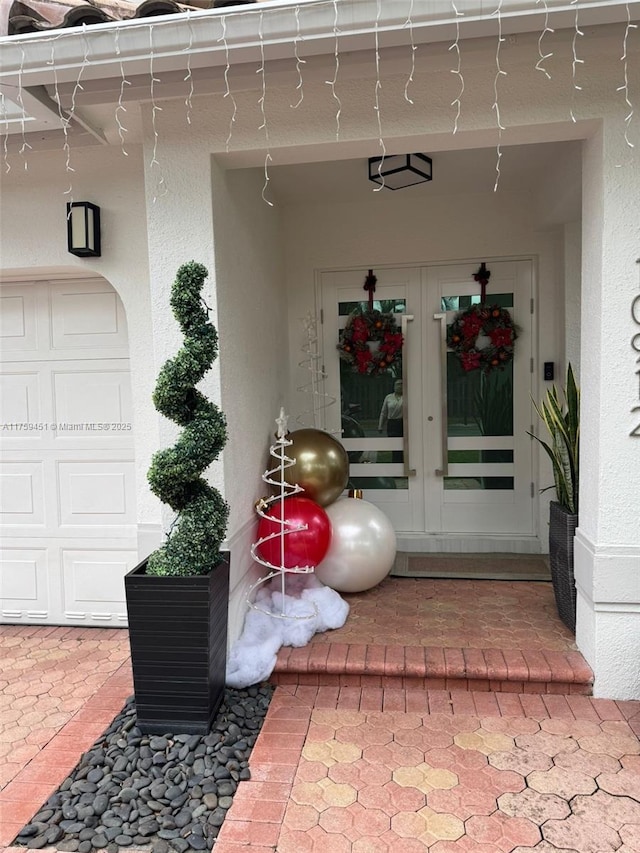 property entrance with stucco siding