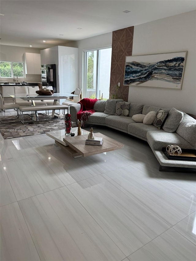 living area featuring plenty of natural light