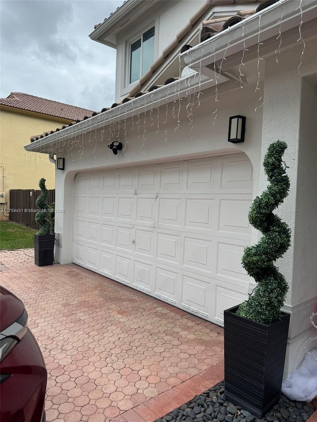 garage featuring fence