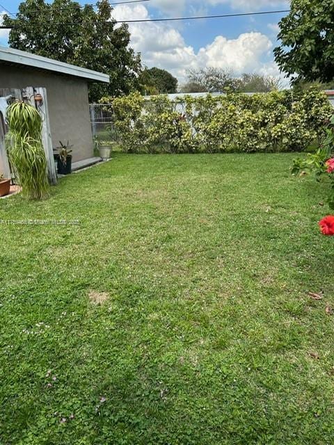 view of yard featuring fence