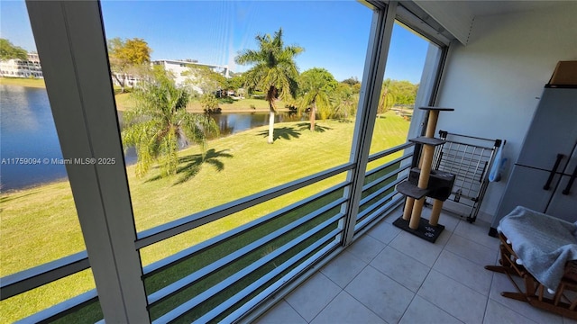 balcony featuring a water view