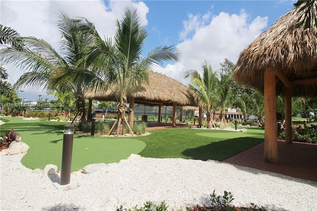 view of community featuring a gazebo and a lawn