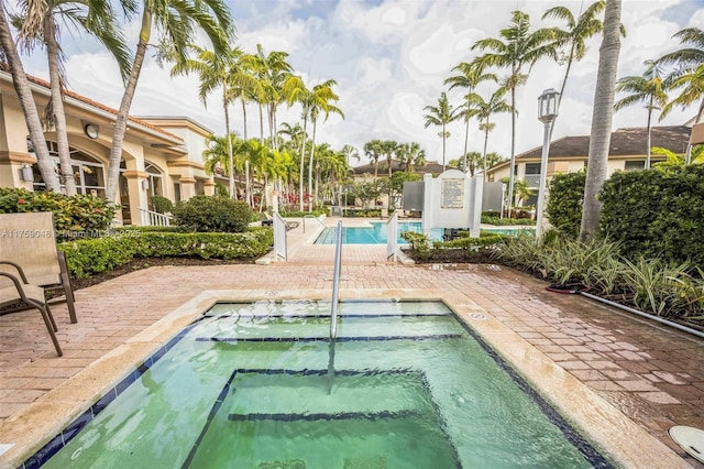 community pool featuring a patio