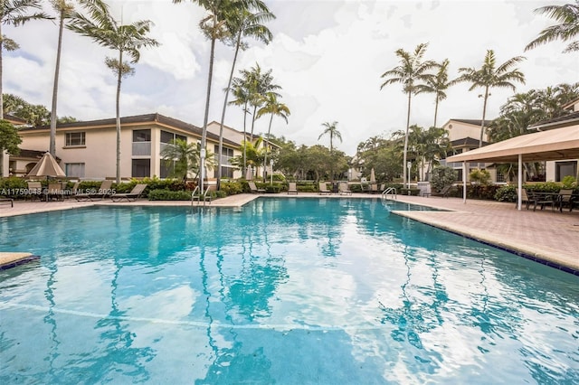 pool featuring a patio area