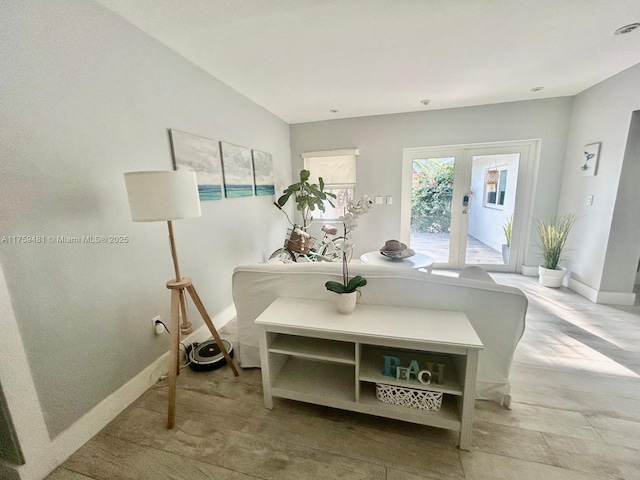 dining room with french doors and baseboards