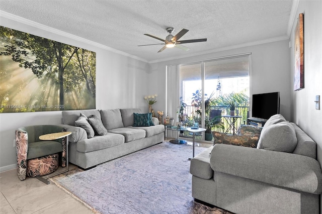 living room featuring ornamental molding, ceiling fan, and a textured ceiling