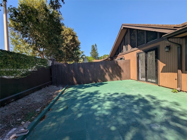 view of yard with a fenced backyard