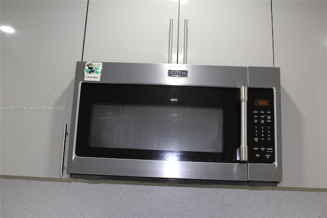 room details with stainless steel microwave