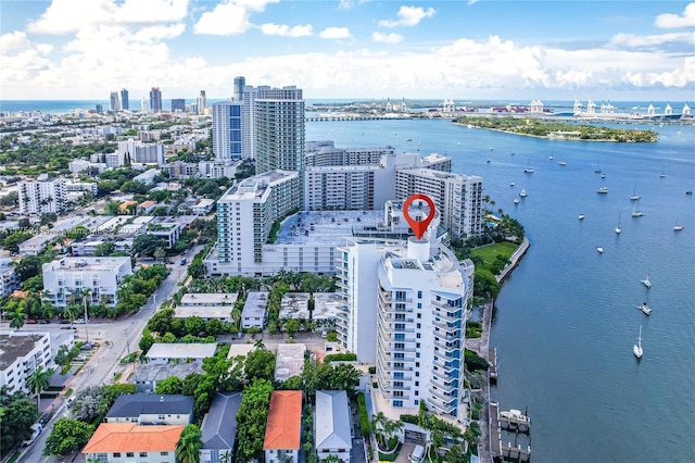 bird's eye view featuring a view of city and a water view