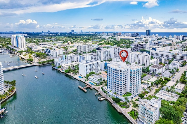 aerial view with a city view and a water view