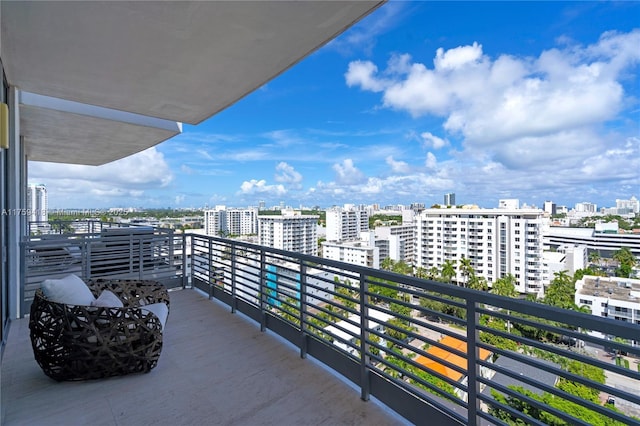 balcony featuring a city view