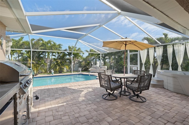 pool with a lanai and a patio area