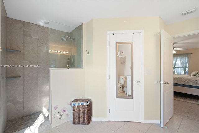 ensuite bathroom featuring visible vents, walk in shower, connected bathroom, and tile patterned floors