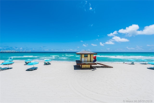 water view featuring a beach view