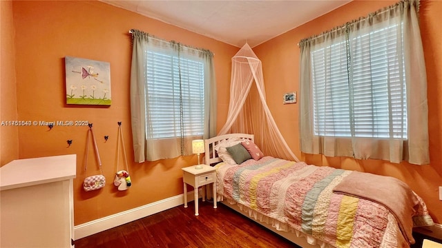 1770 NW 51st Ter, Miami, FL 33142 - bedroom with baseboards and wood finished floors