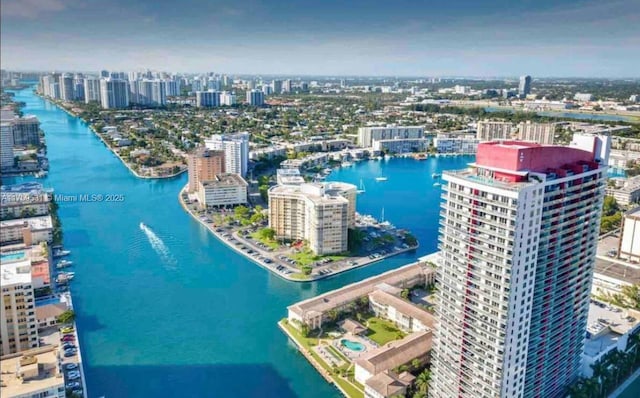 aerial view with a water view and a city view