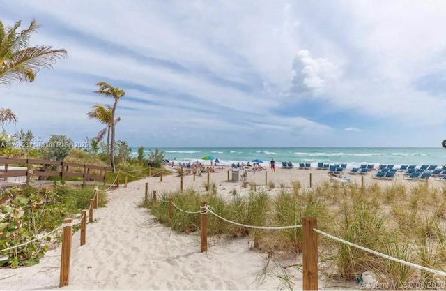 property view of water with a beach view