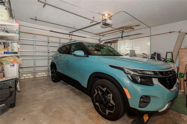 garage featuring a garage door opener