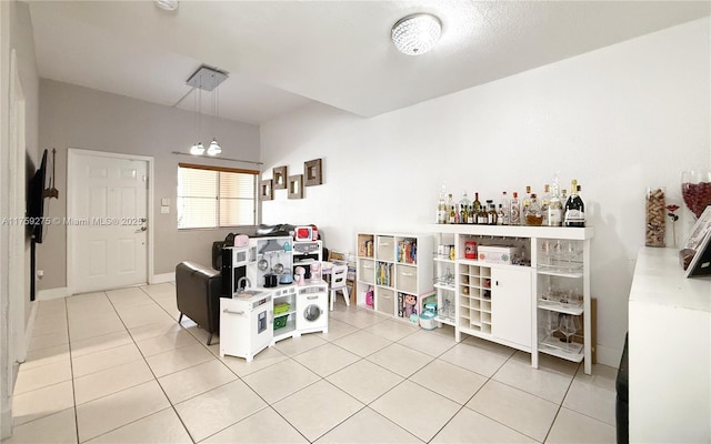 interior space featuring light tile patterned floors