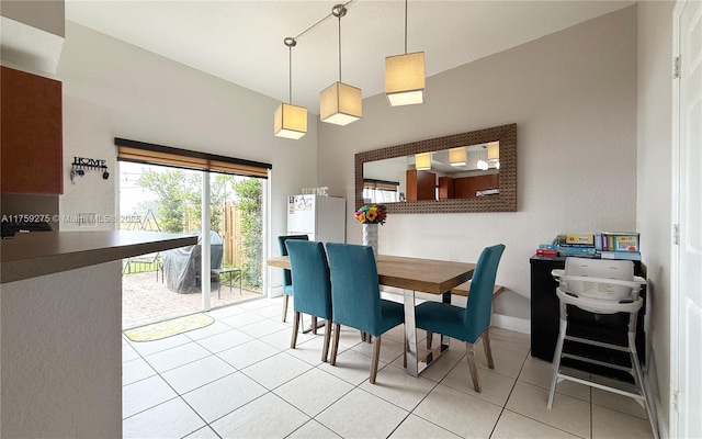 dining room with light tile patterned flooring